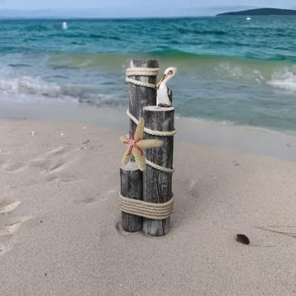 Pelican on Wood Pilings Nautical Statue with Starfish – Coastal Decor for Porch, Garden, or Poolside - Marine Bird Sculpture - DRH Nautical Décor