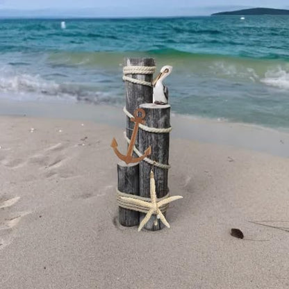 Pelican on Wood Pilings Nautical Statue with Hanging Starfish and Wood Anchor– Coastal Decor for Porch, Garden, or Poolside - Marine Bird Sculpture - Nautical Décor