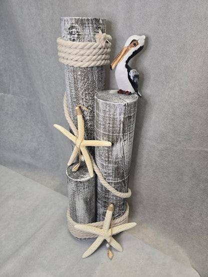 Pelican on Wood Pilings Nautical Statue with Hanging Starfish – Coastal Decor for Porch, Garden, or Poolside - Marine Bird Sculpture - Nautical Décor